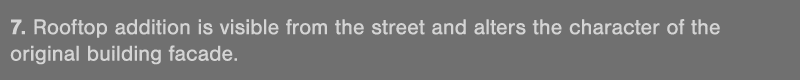 7  Rooftop addition is visible from the street and alters the character of the original building facade 