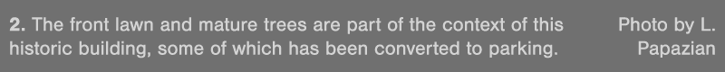 2  The front lawn and mature trees are part of the context of this Photo by L  historic building, some of which has b   