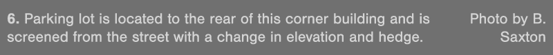 6  Parking lot is located to the rear of this corner building and is Photo by B  screened from the street with a chan   