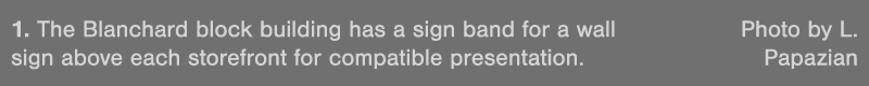1  The Blanchard block building has a sign band for a wall Photo by L  sign above each storefront for compatible pres   